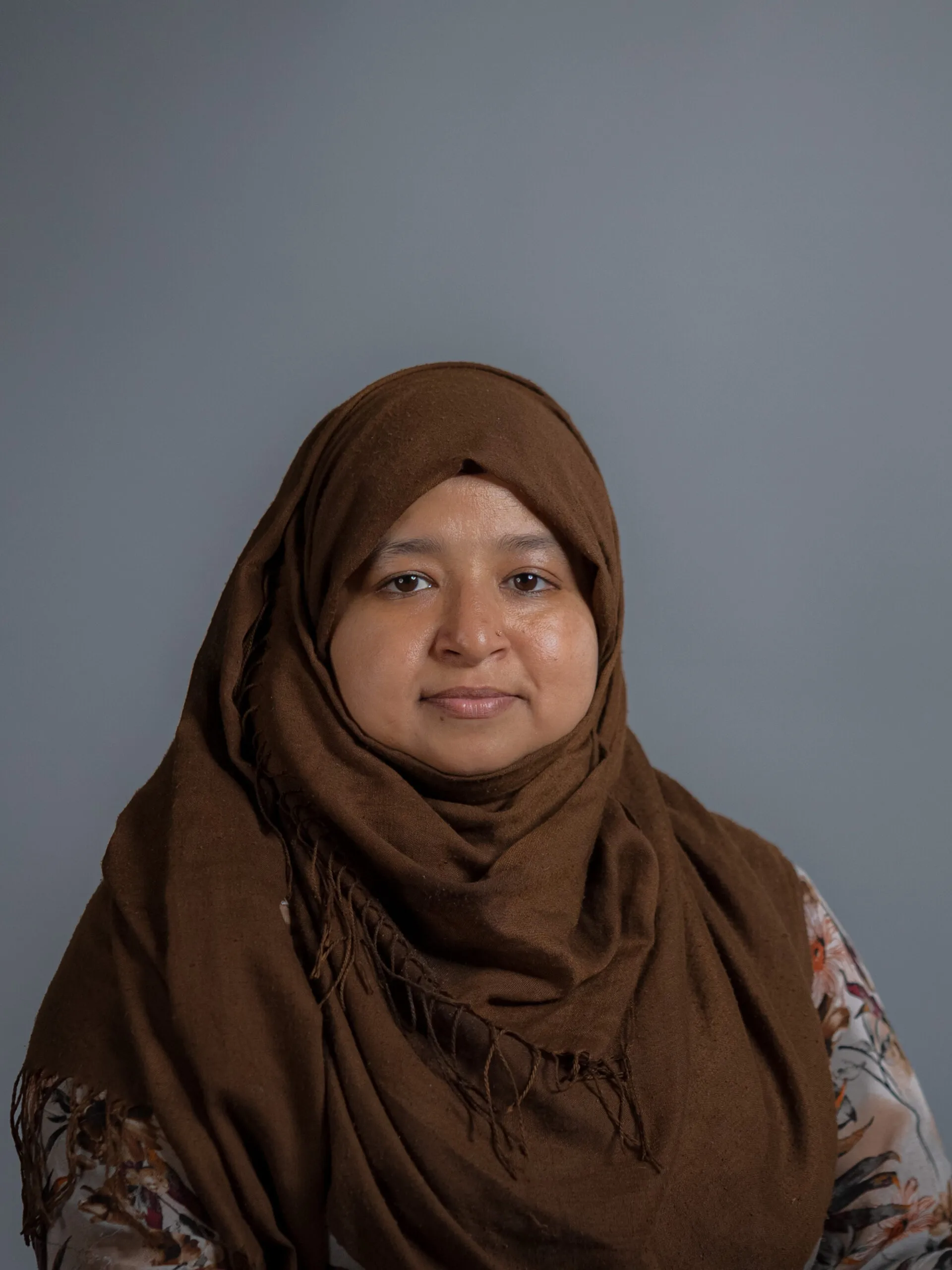 Professional headshot of Marjahan Rahman for Arqam Academy