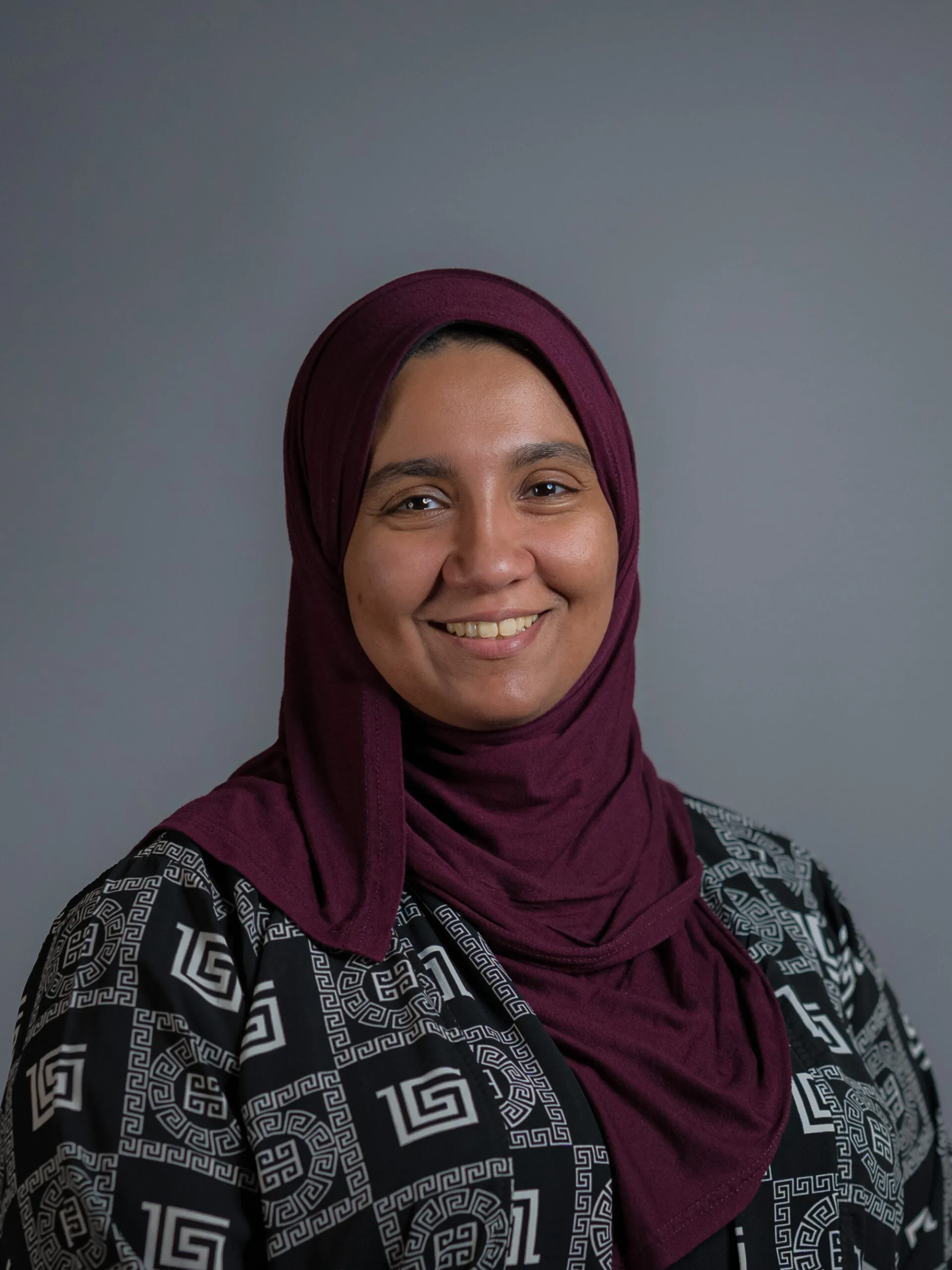 Professional headshot of Sara Aboukoura for Arqam Academy