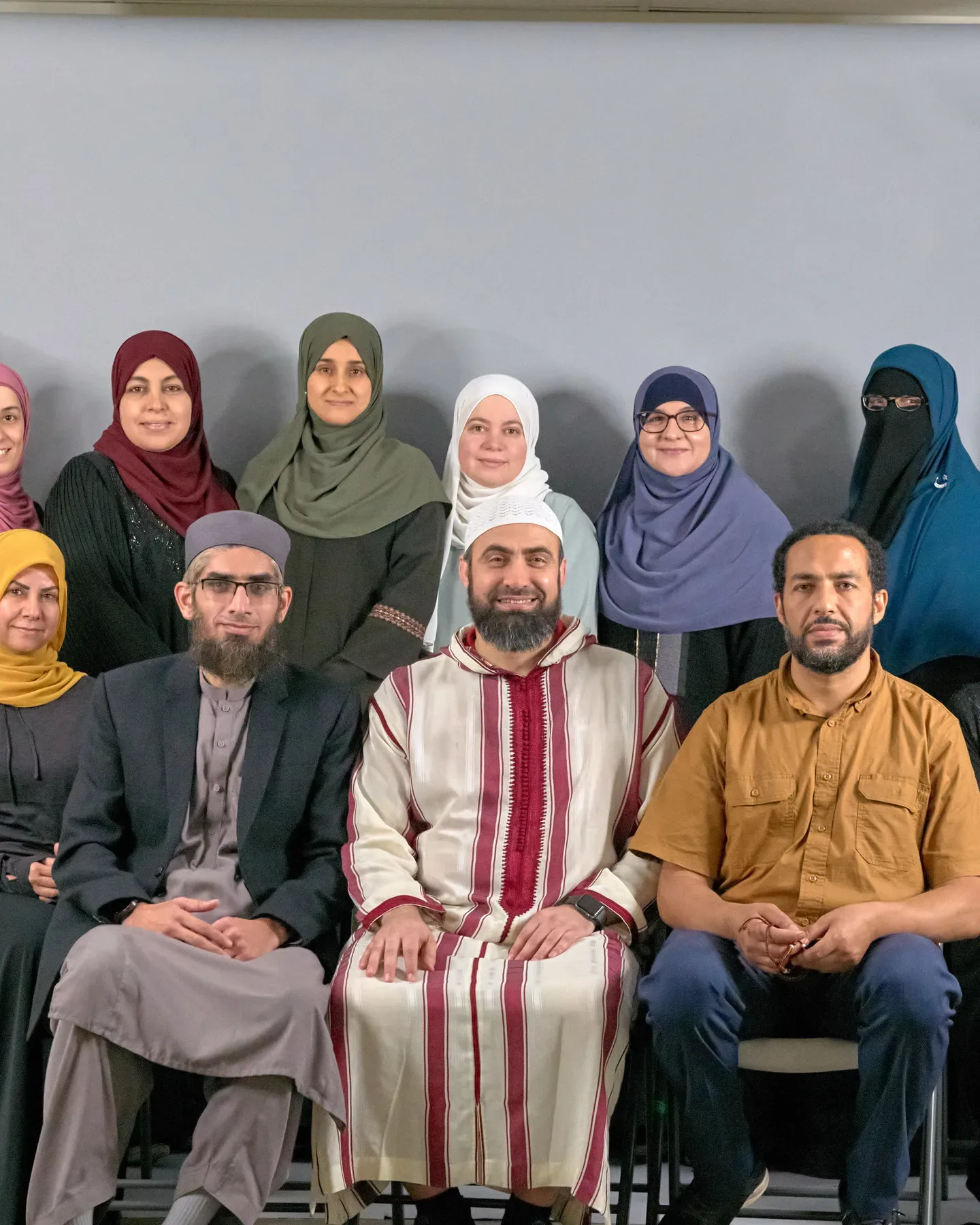 Bayaan Academy staff members posing together for a group portrait